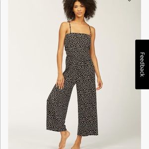 Billabong Try Me Jumpsuit. Black, brown, and white dot. Never worn. Size M.